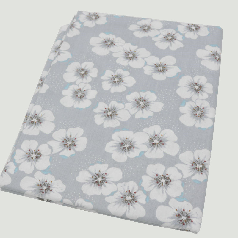 Tissu Gris à Grandes Fleurs Blanches Au Demi Mètre